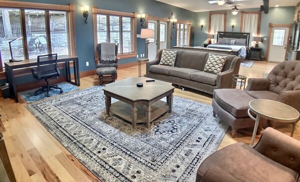 Living room space with ample, comfortable seating.