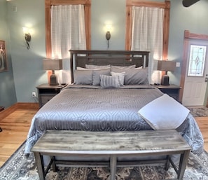 Plush king size bed.