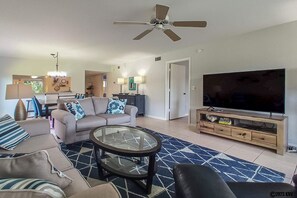 Comfy Accommodations!  Florida-style Living Room opens up to Screened In Lanai