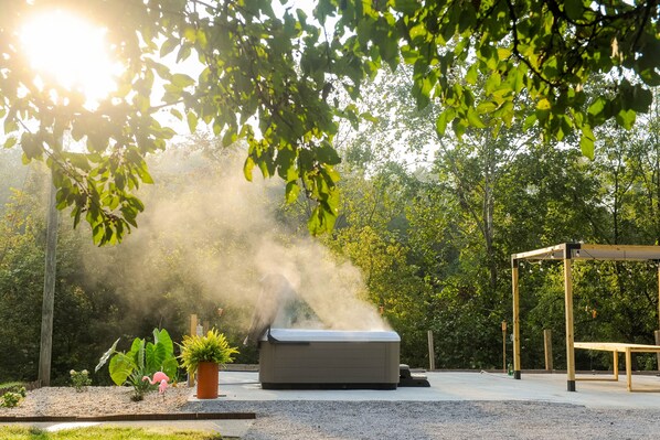 6-person hot tub on private patio. Towells are provided. 