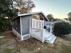 Exterior of house - enjoy a cup of coffee or an evening cocktail on the deck. 