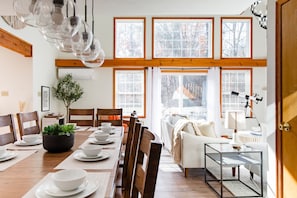 The dining area offers a picturesque backdrop for your culinary creations.