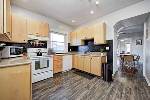 Kitchen stocked with cookware and cooking supplies. Listing has details!