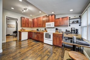 Kitchen stocked with cookware and cooking supplies. Coffee & hot cocoa provided.