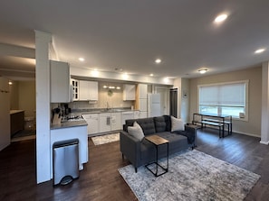 Main living area with hall to bathroom on left.