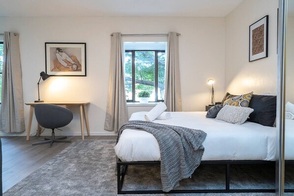 Beside the bed there is a dedicated work space with a lamp - perfect for catching up on some work or emails.