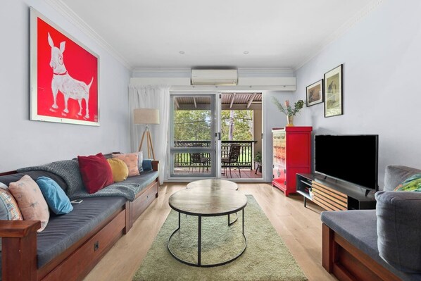 This classic terrace features open plan kitchen and living with comfortable sofa seating to kick back and relax.