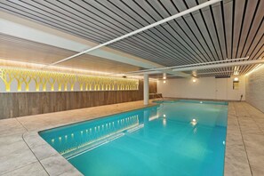 Cool off with a refreshing dip in the sparkling shared pool— the perfect way to unwind after a day of adventure.