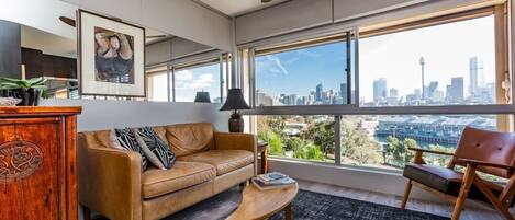 Enjoy million-dollar views of Sydney's skyline from the chic living area.
