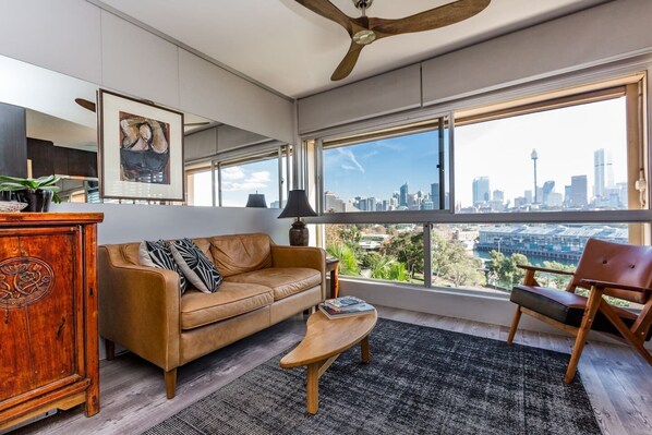 Enjoy million-dollar views of Sydney's skyline from the chic living area.
