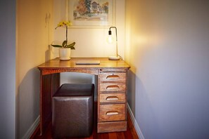 A cosy study nook is perfect for those travelling for business. The apartment features Wi-Fi throughout.
