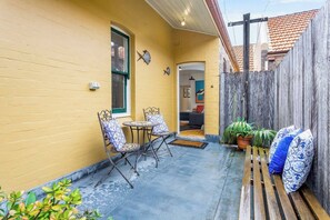 The apartment has access to a small backyard area for you to enjoy some outdoor time with a good book and a cuppa. 