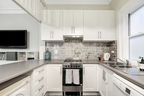 The kitchen is fully equipped for all your holiday needs with a fridge, stove, oven, microwave and Nespresso coffee maker.

