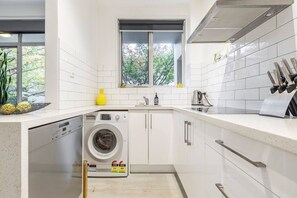 Make use of a full kitchen, along with an internal washing machine adding to your daily convenience. 
