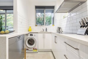 Make use of a full kitchen, along with an internal washing machine adding to your daily convenience. 
