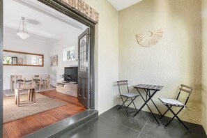 The balcony offers a charming nook to enjoy some fresh air, perhaps over your morning coffee or an afternoon wine.