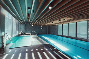 The building has luxurious amenities for your use which include a stunning indoor pool and a well-equipped gym