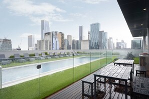 Make a splash in the residents’ lap pool or unwind with a book on the sun beds.

