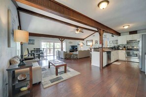 Bright, large windows throughout this home bring the outdoors in! Perfect place to relax and get ready for the day or unwind after a long day on the lake.