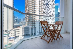 Balcony with outdoor furniture.