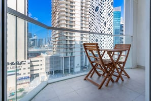 Balcony with outdoor furniture.