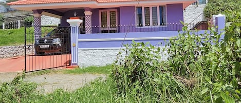 Villa Front showing porch gardens on either sides