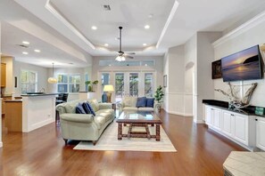 The family room is open, spacious and has tall ceilings