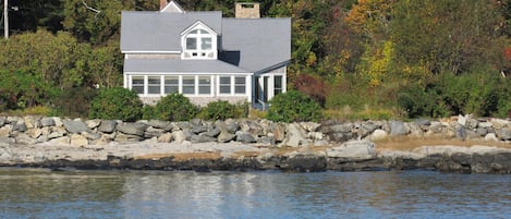 The cottage in private surroundings - view from across Spar Cove