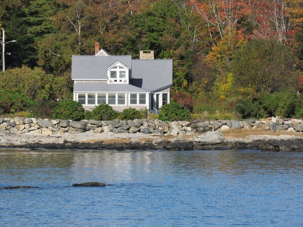 The cottage in private surroundings - view from across Spar Cove