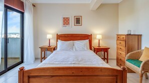 The master bedroom with an ensuite bathroom offers a good cenario to relax, while looking outside 
#bedroom #balcony #view #algarve #portugal