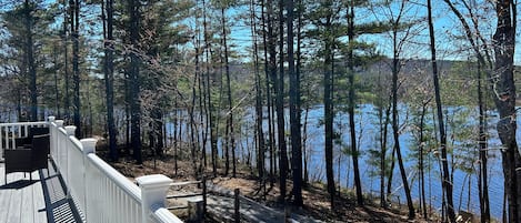 view of the lake and enclosed back yard, from the back deck 