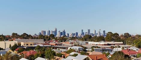 Take in impressive views over the neighbourhood and city skyline. The apartment is well connected to the CBD with a tram stop at the door. 