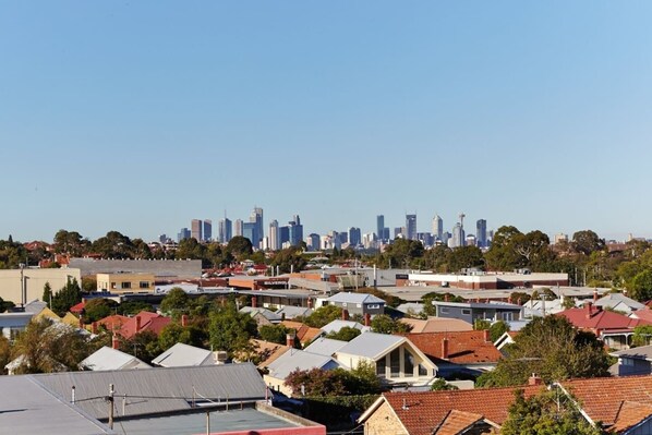 Take in impressive views over the neighbourhood and city skyline. The apartment is well connected to the CBD with a tram stop at the door. 