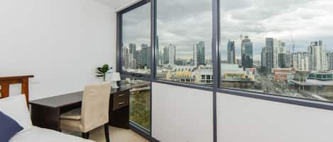 A master bedroom comes furnished with a queen bed, built-in wardrobes and stunning views of Southbank