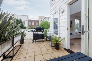 The outdoor balcony offers a gas BBQ for cooking up a feast.