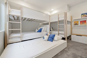 Bunk room with trundle bed
