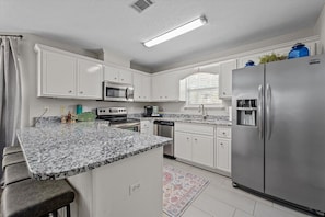 Kitchen with granite countertops