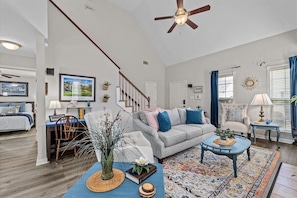 Main living area with ceiling fan