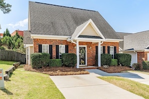 Brick home in quaint patio home community
