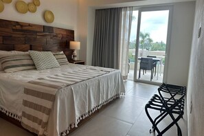 Master ensuite bedroom with king-size bed