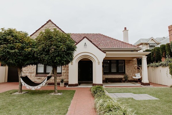 The large front garden - private and secure with entry gates.