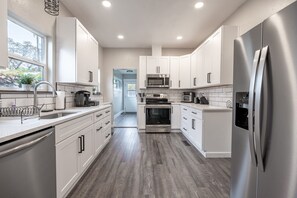 Beautiful kitchen with plenty of space and storage to cook up any meal!