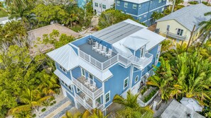 Aerial Drone Shot of the Property with rooftop balcony.