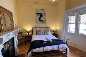 Bedroom one - queen size bed and beautiful furniture