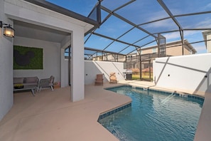 Private Heated Pool with Lounge area, long chairs and BBQ