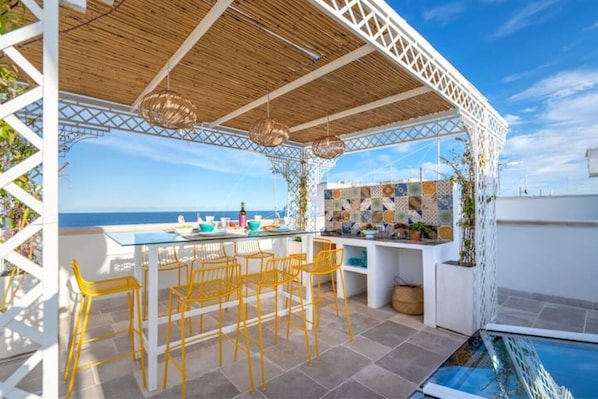 Panoramic views of the ocean and old city from the terrace.