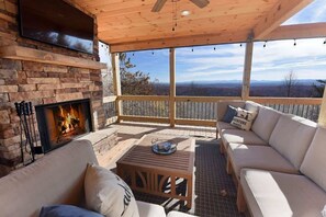 Cozy up by the wood burning fireplace!
