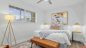 Unwind in a king-sized bed with premium linens.