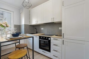 Elegant kitchen with a big table.