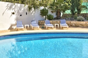 Relaxing by the pool